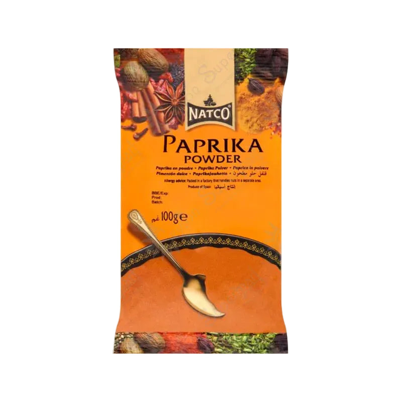 NATCO Paprika Powder packaging with an orange background and spoon illustration.